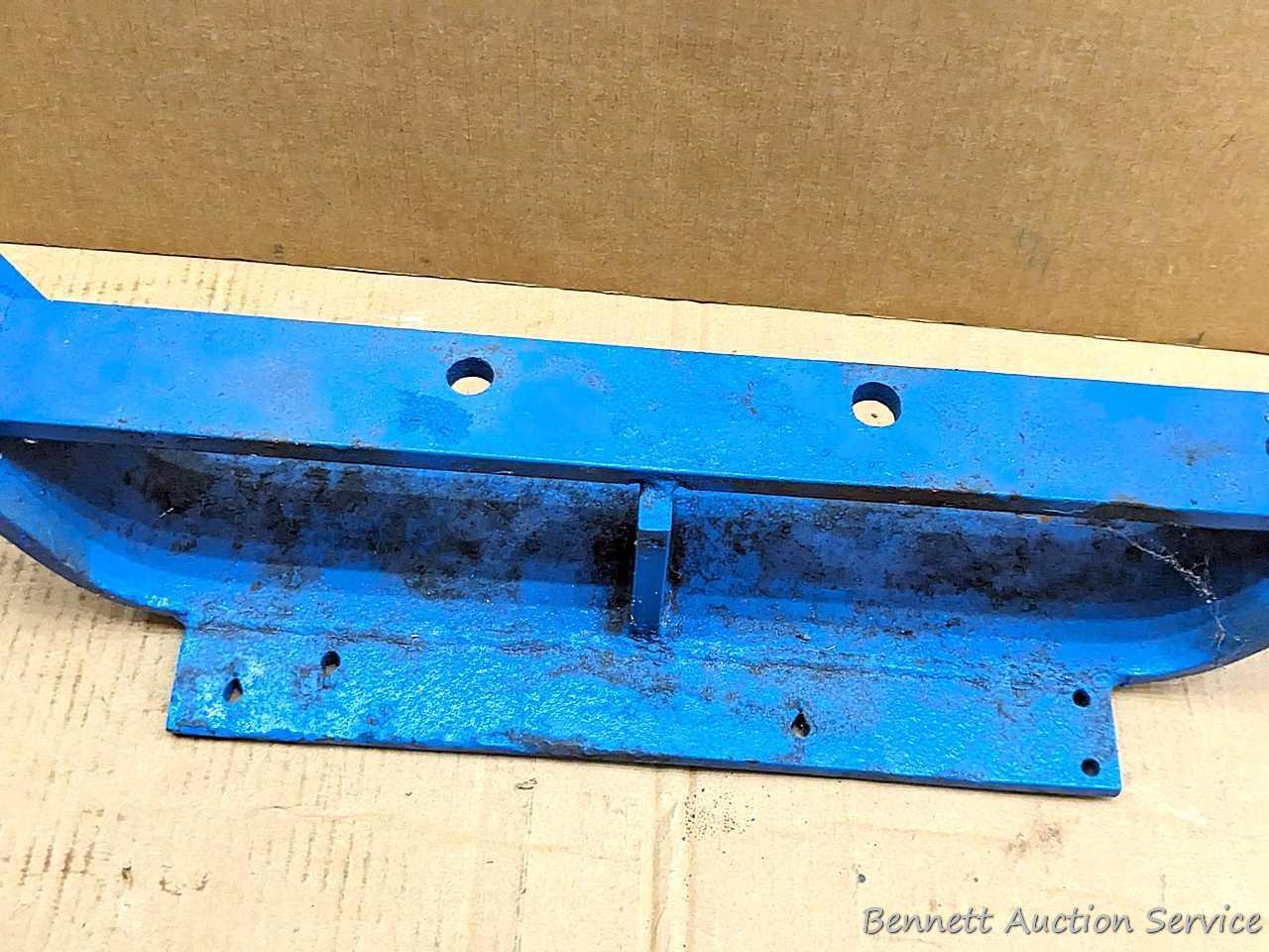 Tractor suitcase weight rack may fit your blue tractor. 2' wide.