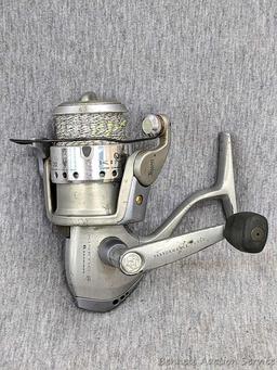 Two Zebco Quantum spinning reels. One is Kinetic KT30 PTi, the other a SS 4 Long Stroke.