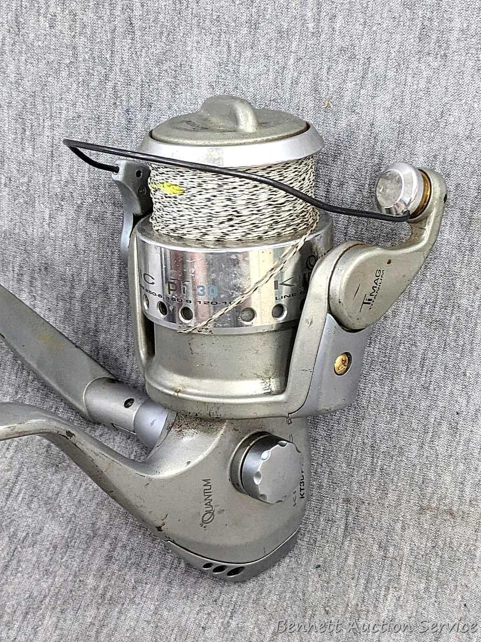Two Zebco Quantum spinning reels. One is Kinetic KT30 PTi, the other a SS 4 Long Stroke.