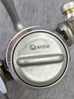 Two Zebco Quantum spinning reels. One is Kinetic KT30 PTi, the other a SS 4 Long Stroke.