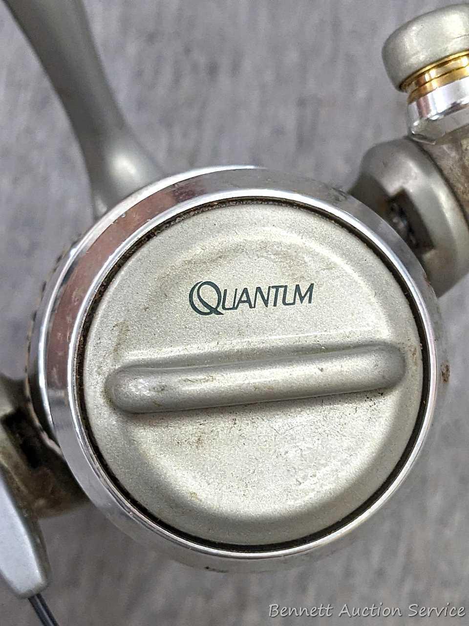 Two Zebco Quantum spinning reels. One is Kinetic KT30 PTi, the other a SS 4 Long Stroke.