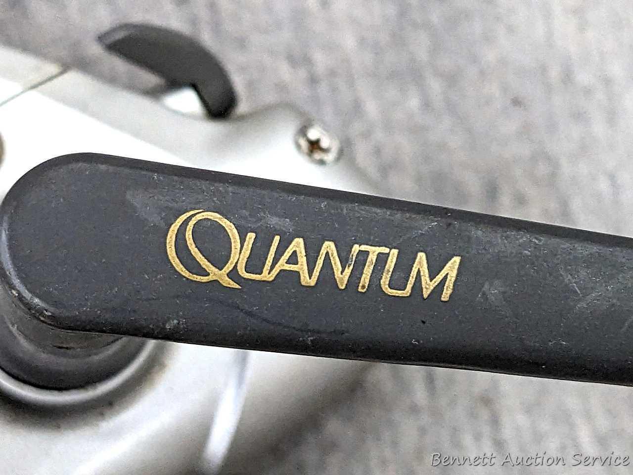 Two Zebco Quantum spinning reels. One is Kinetic KT30 PTi, the other a SS 4 Long Stroke.