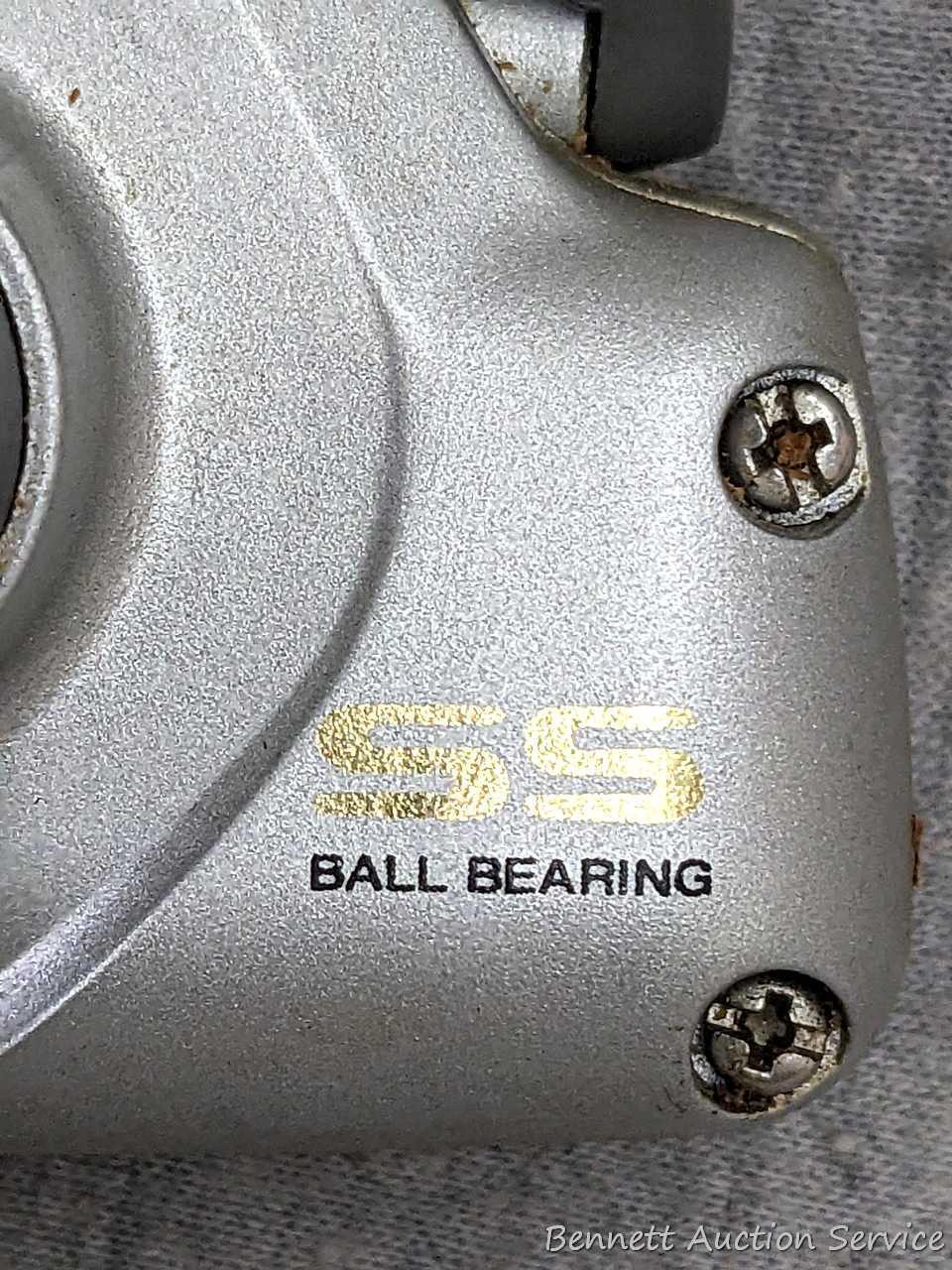 Two Zebco Quantum spinning reels. One is Kinetic KT30 PTi, the other a SS 4 Long Stroke.