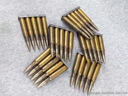 30 Rounds of 7mm Mauser ammunition with FN 69 headstamps, FMJ bullets, and in clips that are marked