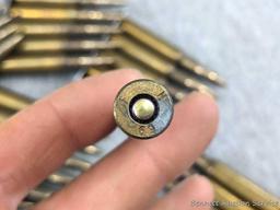 30 Rounds of 7mm Mauser ammunition with FN 69 headstamps, FMJ bullets, and in clips that are marked