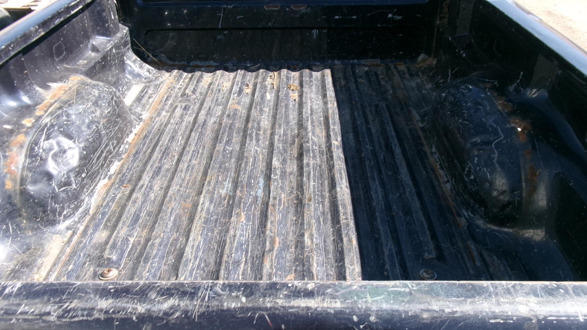 2002 FORD EXT. CAB FORD RANGER, 4 cyl., 5 spd. Manual,  A-OK, 228,000 miles, ph. Dave @ 689-9011