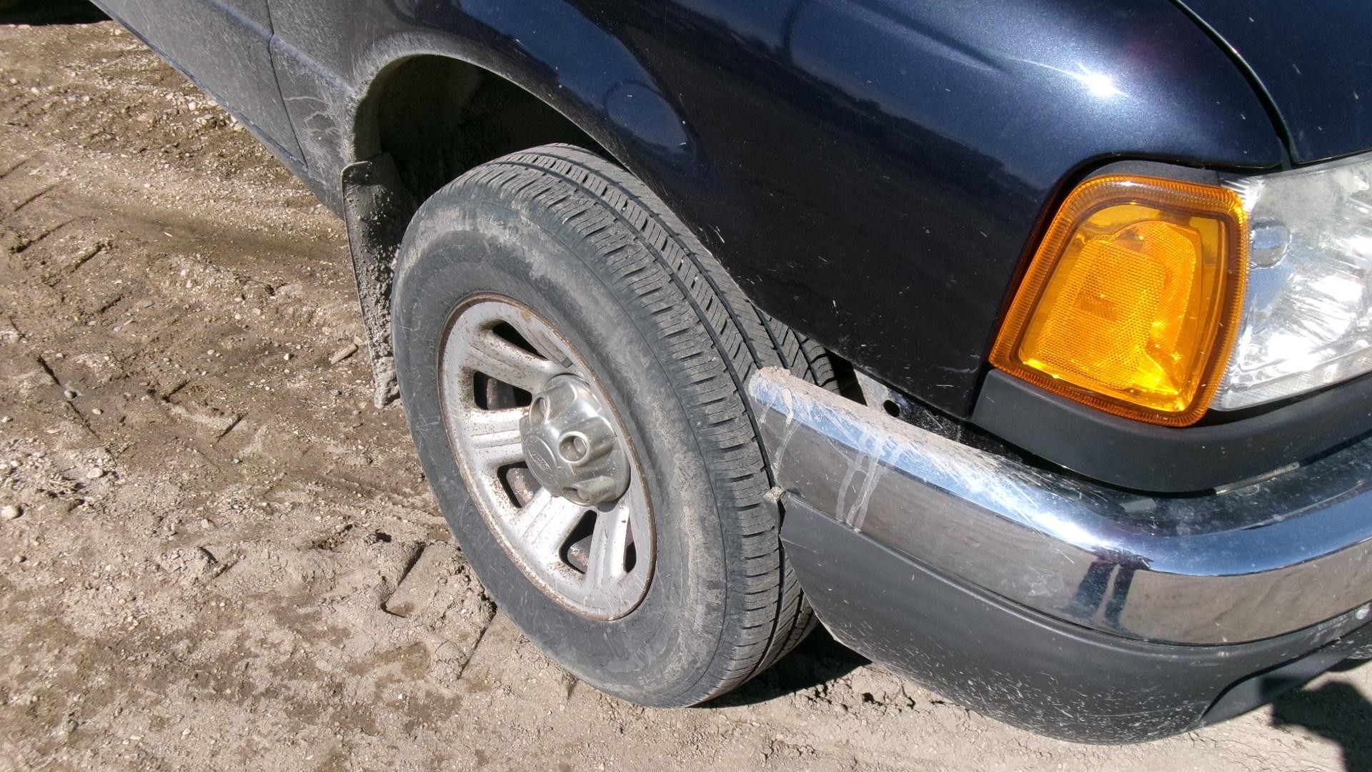 2002 FORD EXT. CAB FORD RANGER, 4 cyl., 5 spd. Manual,  A-OK, 228,000 miles, ph. Dave @ 689-9011