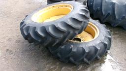 2-11.2 x 24" 8 BOLT-one tire good-one bad