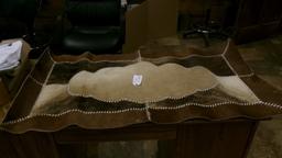 26" X 49" COWHIDE RUG, BEAR SKULL, 11 BEAR CLAWS, & A SHARK TOOTH