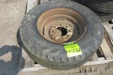 9.6 X 16.5 TIRE ON 8 BOLT RIM