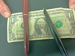US Dollar Bill & 2 Fountain Pens