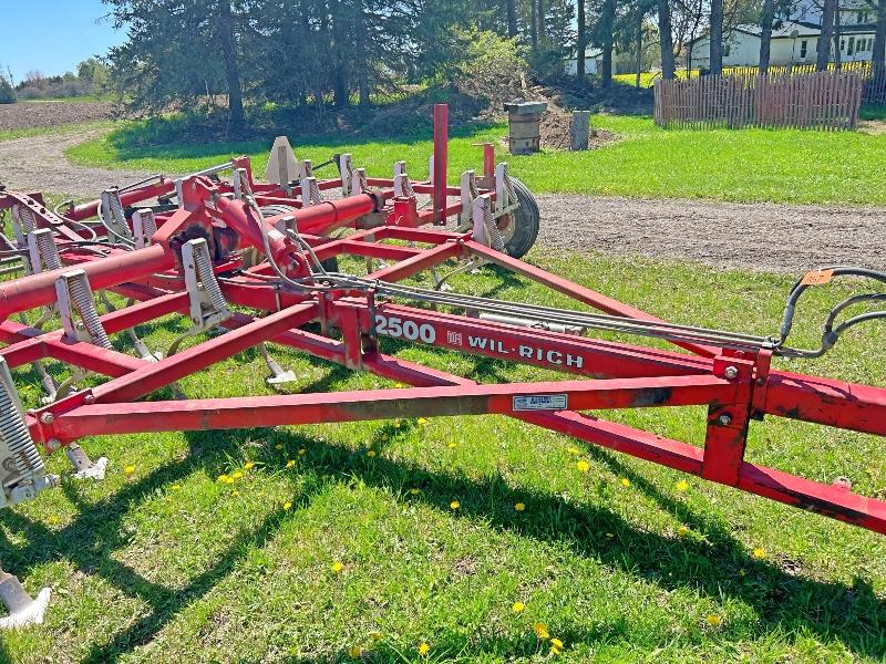 2500 Wil-Rich 20' Cultivator with Hydraulic Wings with Harrow Attachment