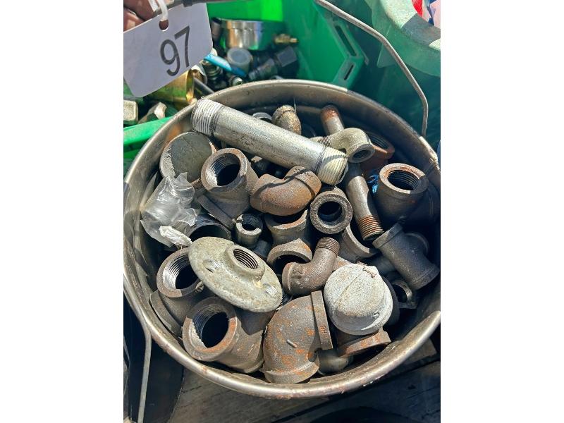 Pail of Black Pipe Fittings