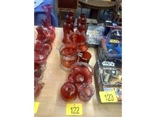 Row of Cranberry Glass