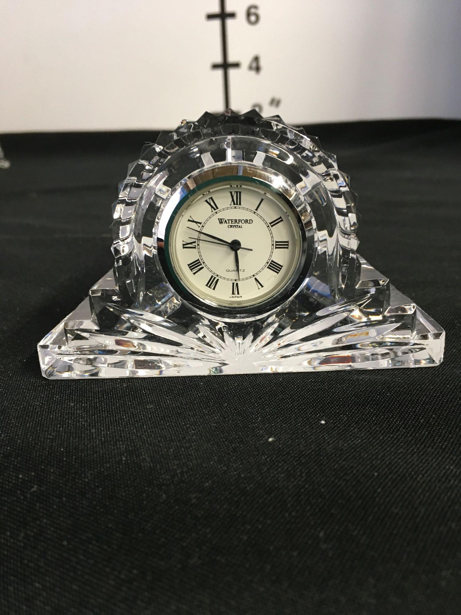 9 pieces Assorted collectible glass pieces. Includes tray. Waterford Crystal mini clock, Crystal