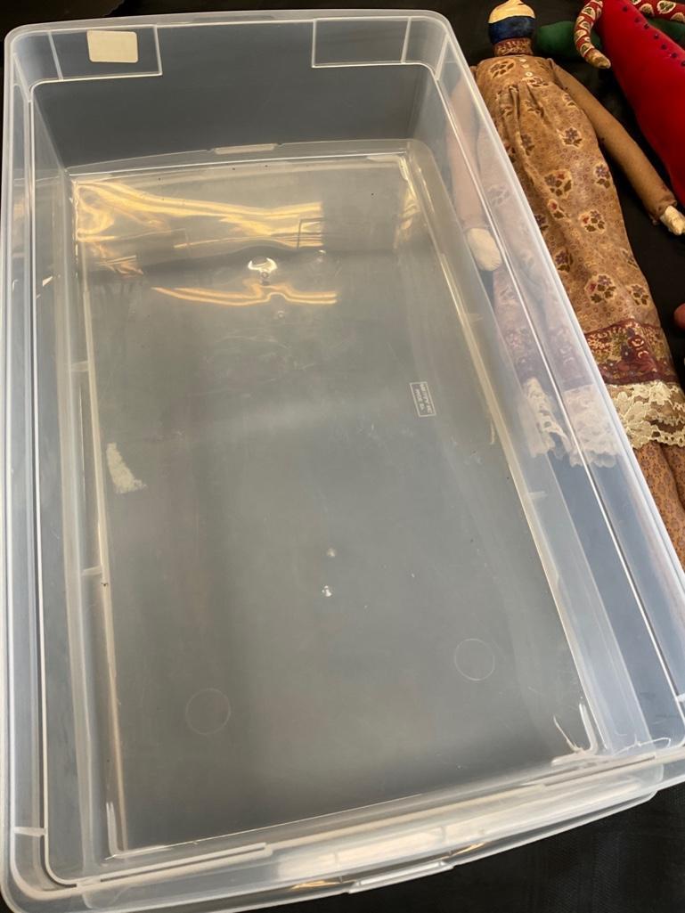Vintage dolls and horse with The Container Store plastic storage unit