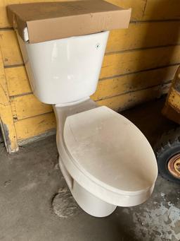 2 new toilets, 1 used. 3 pieces