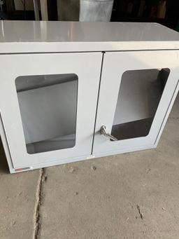 Uline two door, two shelf storage metal cabinet. 27" x 36" x14"