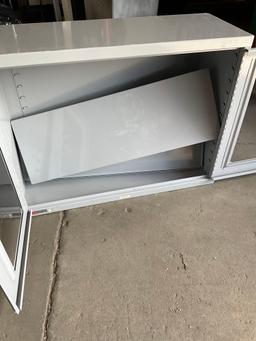 Uline two door, two shelf storage metal cabinet. 27" x 36" x14"