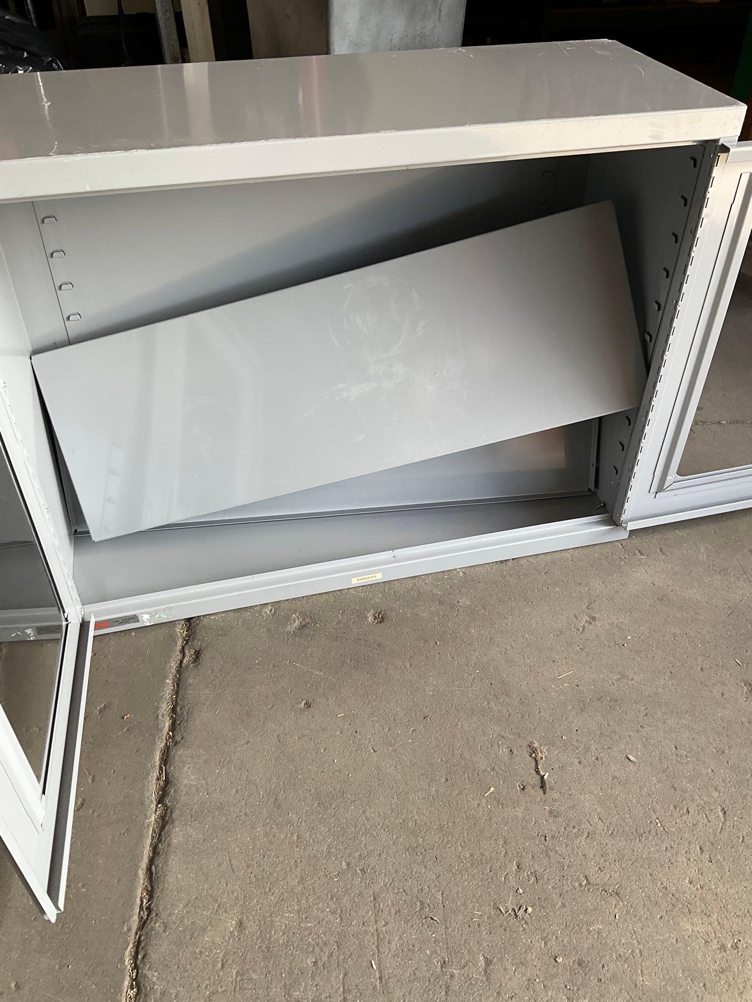Uline two door, two shelf storage metal cabinet. 27" x 36" x14"