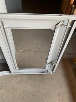 Uline two door, two shelf storage metal cabinet. 27" x 36" x14"
