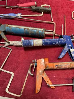 Assorted roller handles & caulk guns. 15 pieces