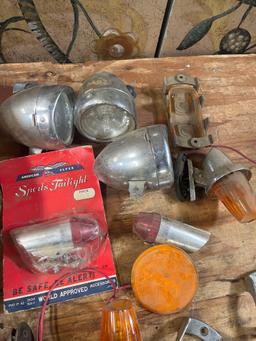 Assorted tail lights. parts, etc. Over 25 pieces
