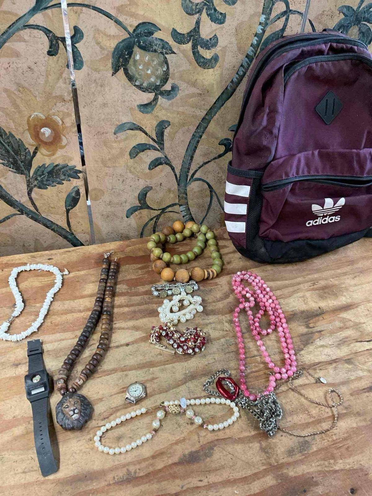 Adidas back pack and assorted custom jewelry.