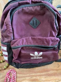 Adidas back pack and assorted custom jewelry.