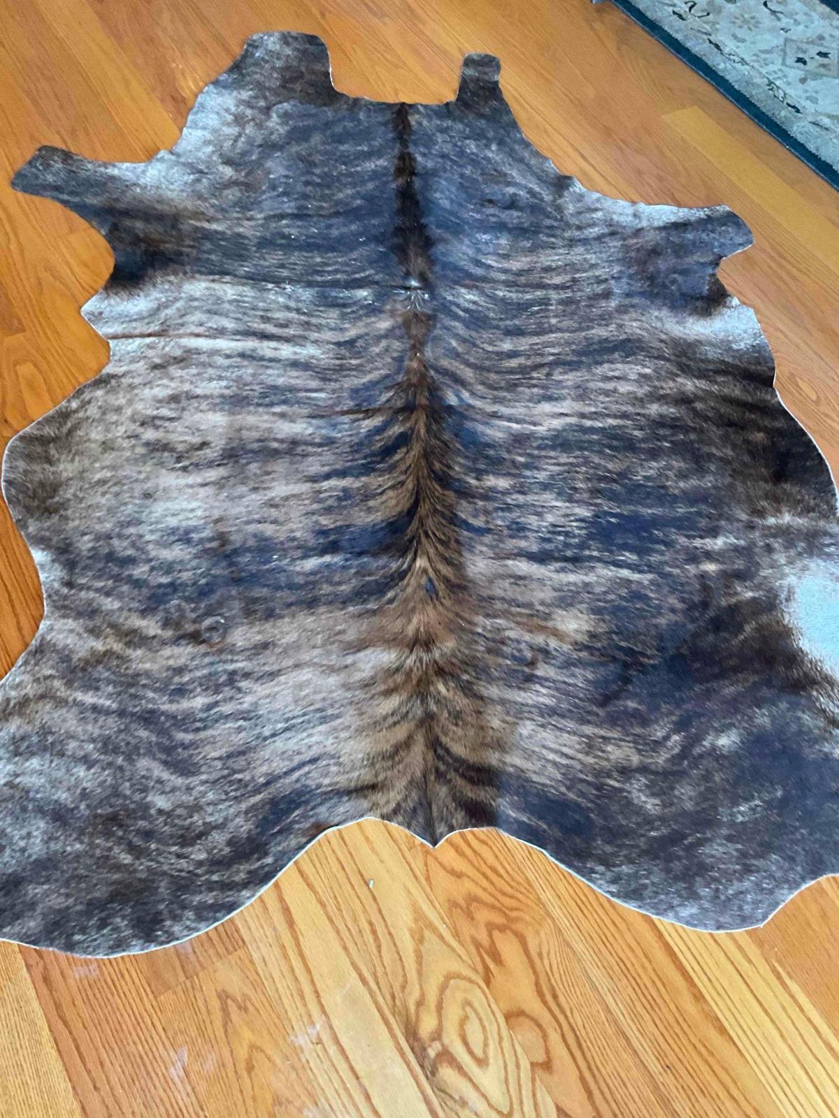 Animal hide area rug 7' x 74"