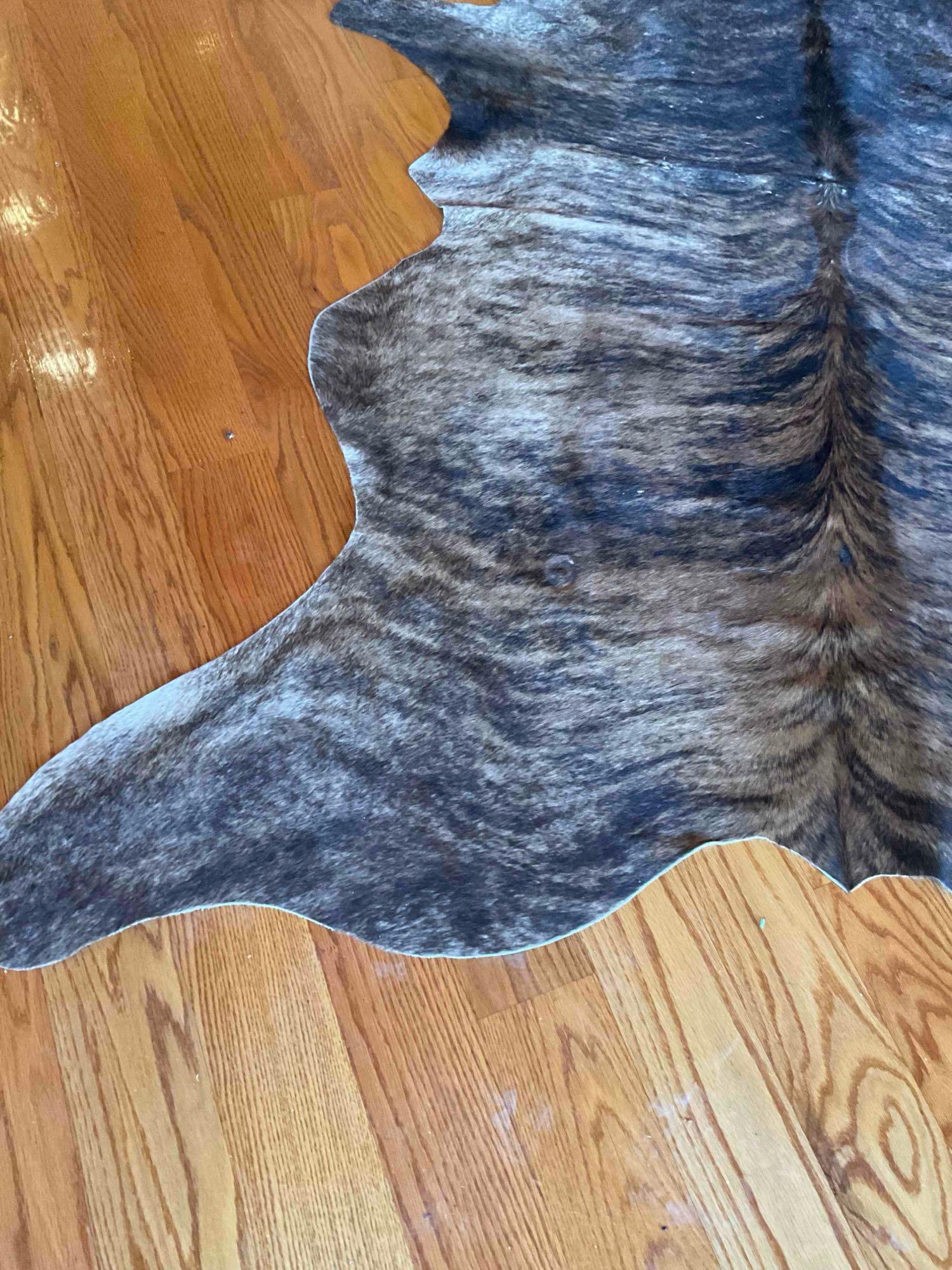 Animal hide area rug 7' x 74"