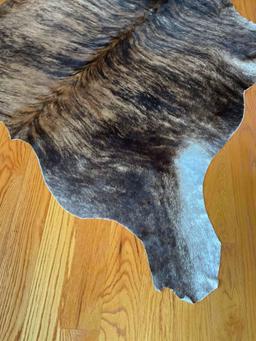 Animal hide area rug 7' x 74"