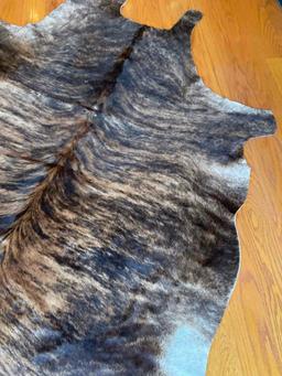 Animal hide area rug 7' x 74"