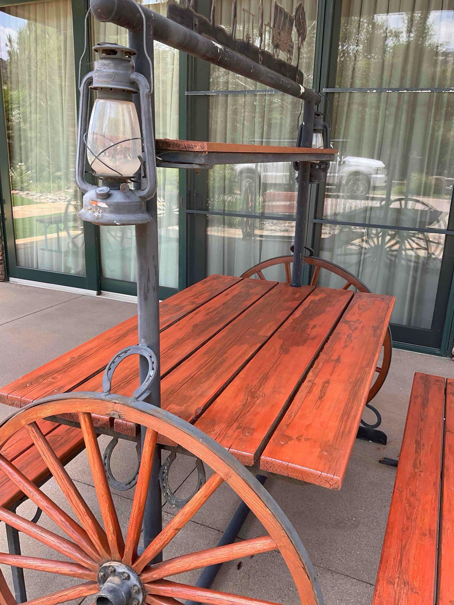 Iron/ wood Western Wagon wheel picnic table with two benches