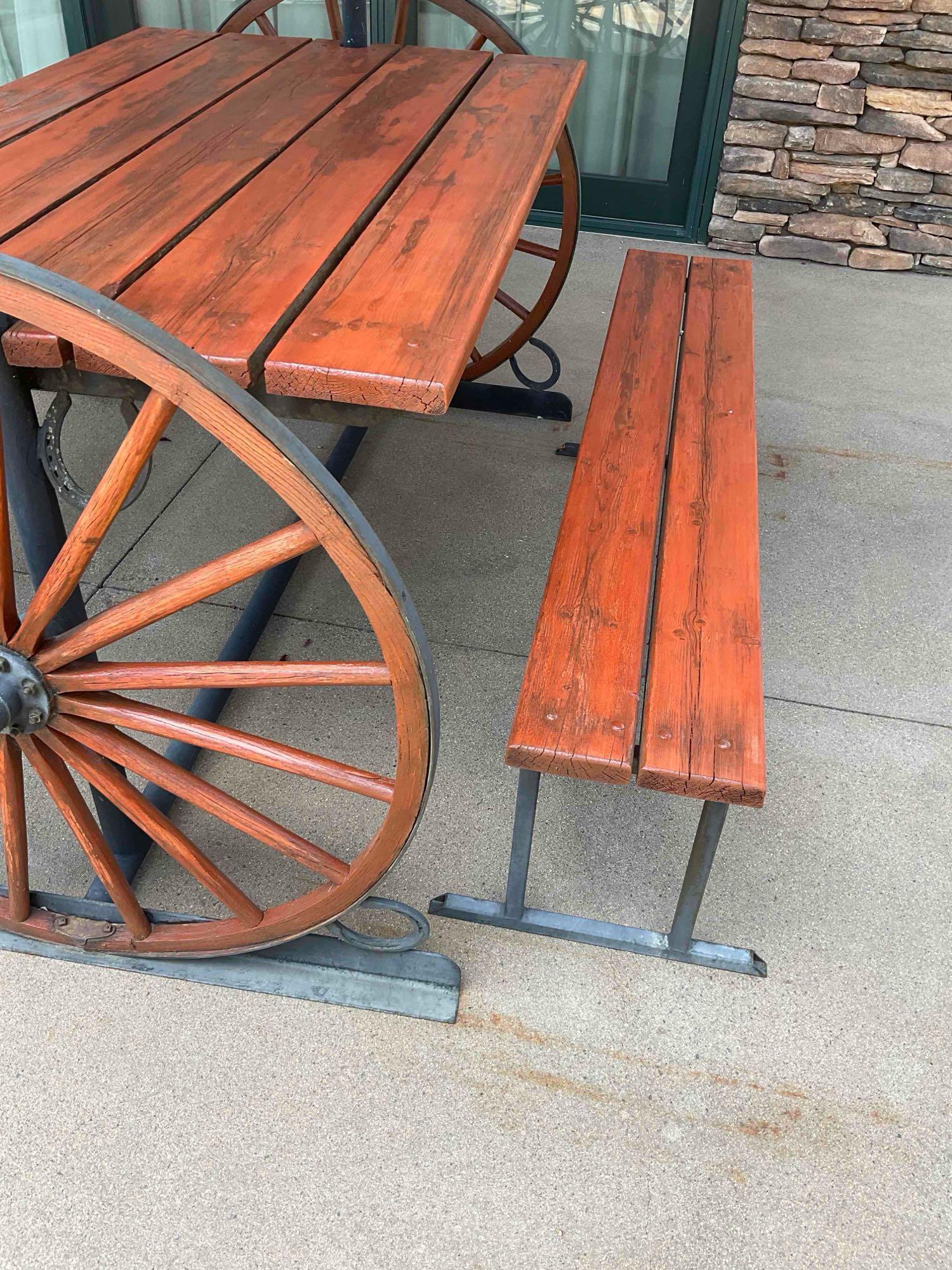 Iron/ wood Western Wagon wheel picnic table with two benches