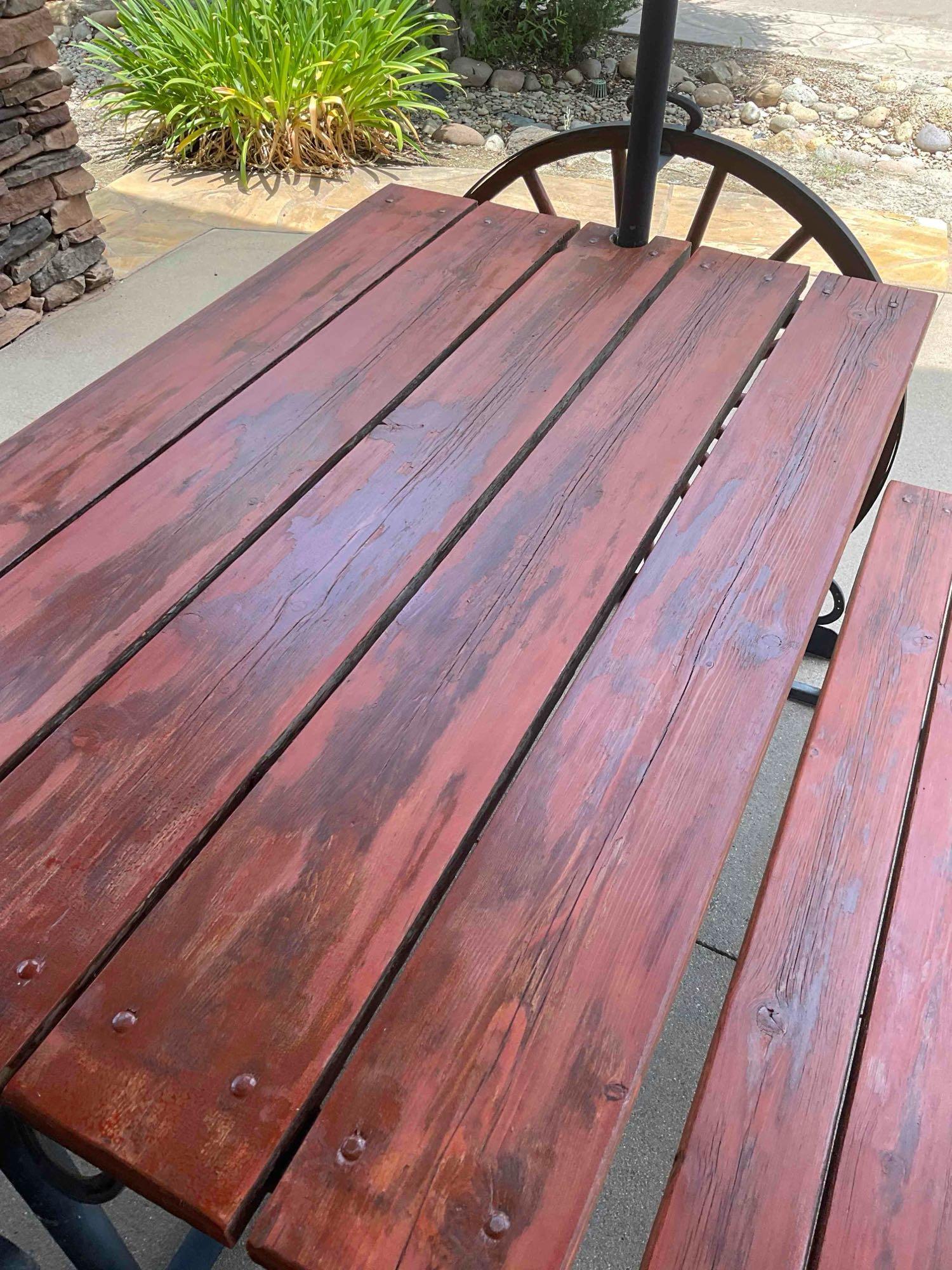 Iron/ wood Western Wagon wheel picnic table with two benches