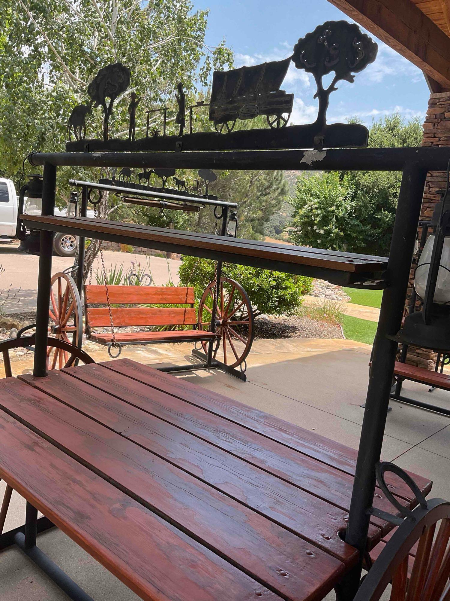 Iron/ wood Western Wagon wheel picnic table with two benches
