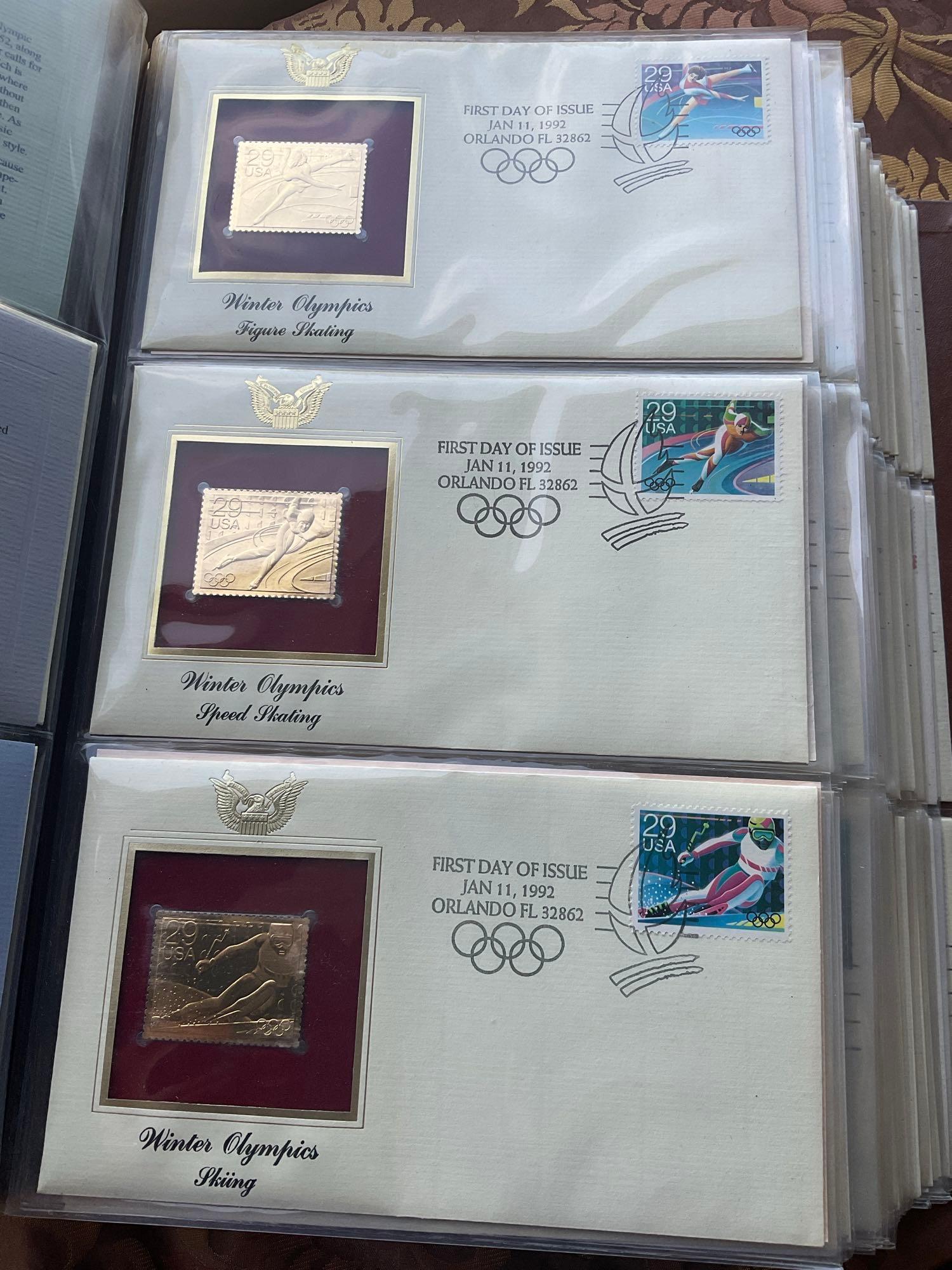 Golden Replica of Unites States stamps album with replicas on a gleaming surface 22kt gold & other