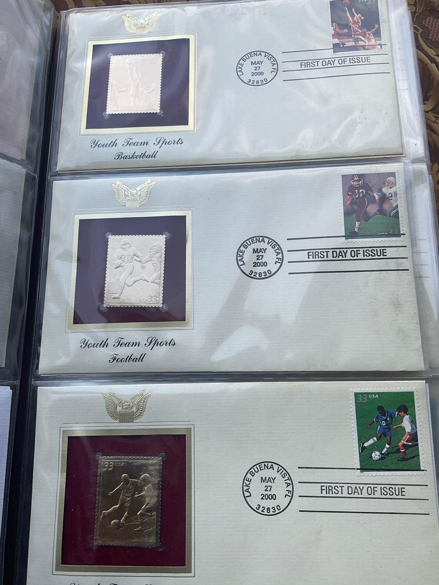 Golden Replica of Unites States stamps album with replicas on a gleaming surface 22kt gold & other