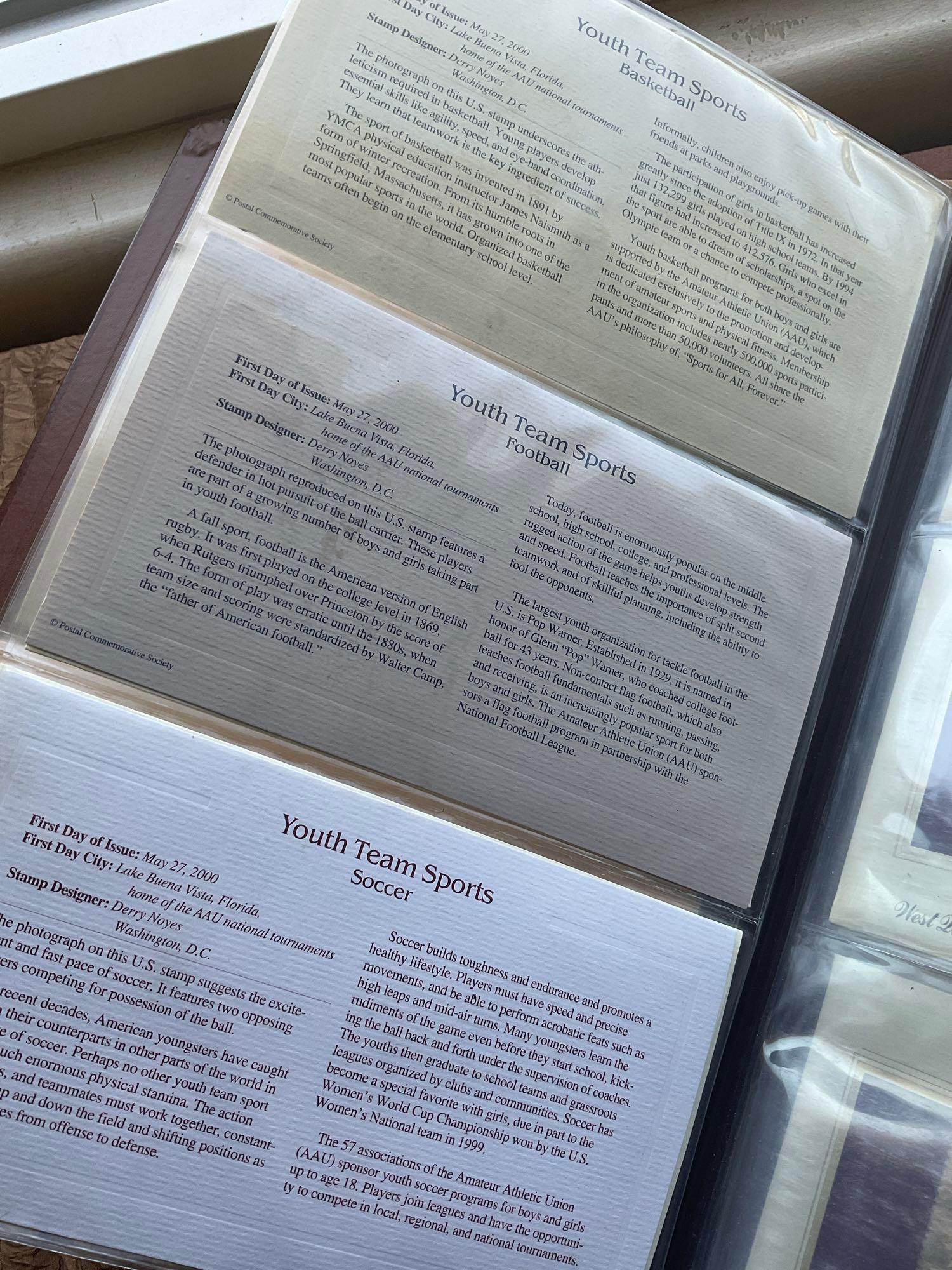 Golden Replica of Unites States stamps album with replicas on a gleaming surface 22kt gold & other