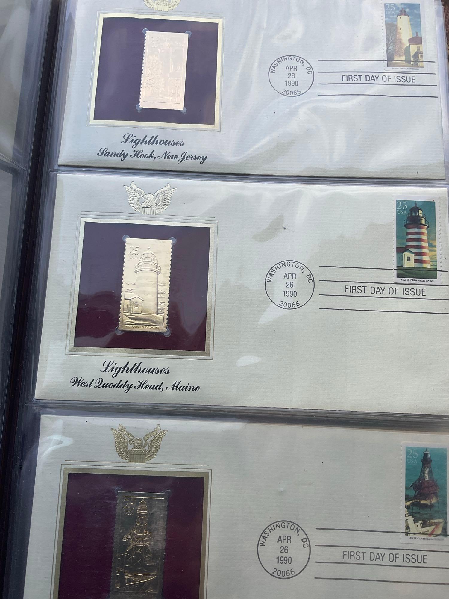 Golden Replica of Unites States stamps album with replicas on a gleaming surface 22kt gold & other
