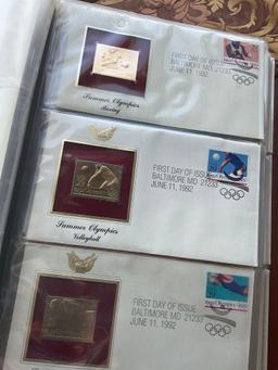 Golden Replica of Unites States stamps album with replicas on a gleaming surface 22kt gold & other