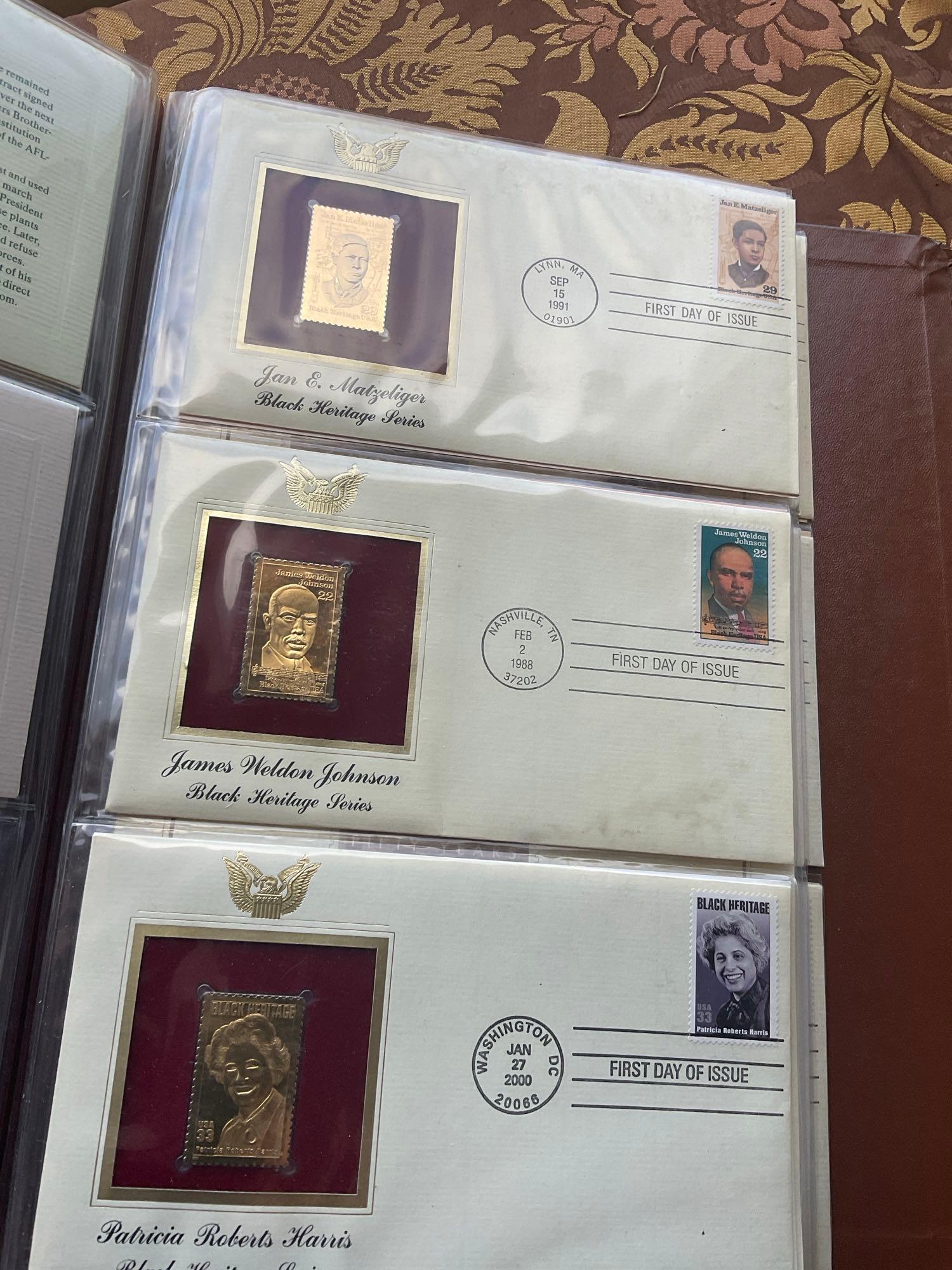 Golden Replica of Unites States stamps album with replicas on a gleaming surface 22kt gold & other
