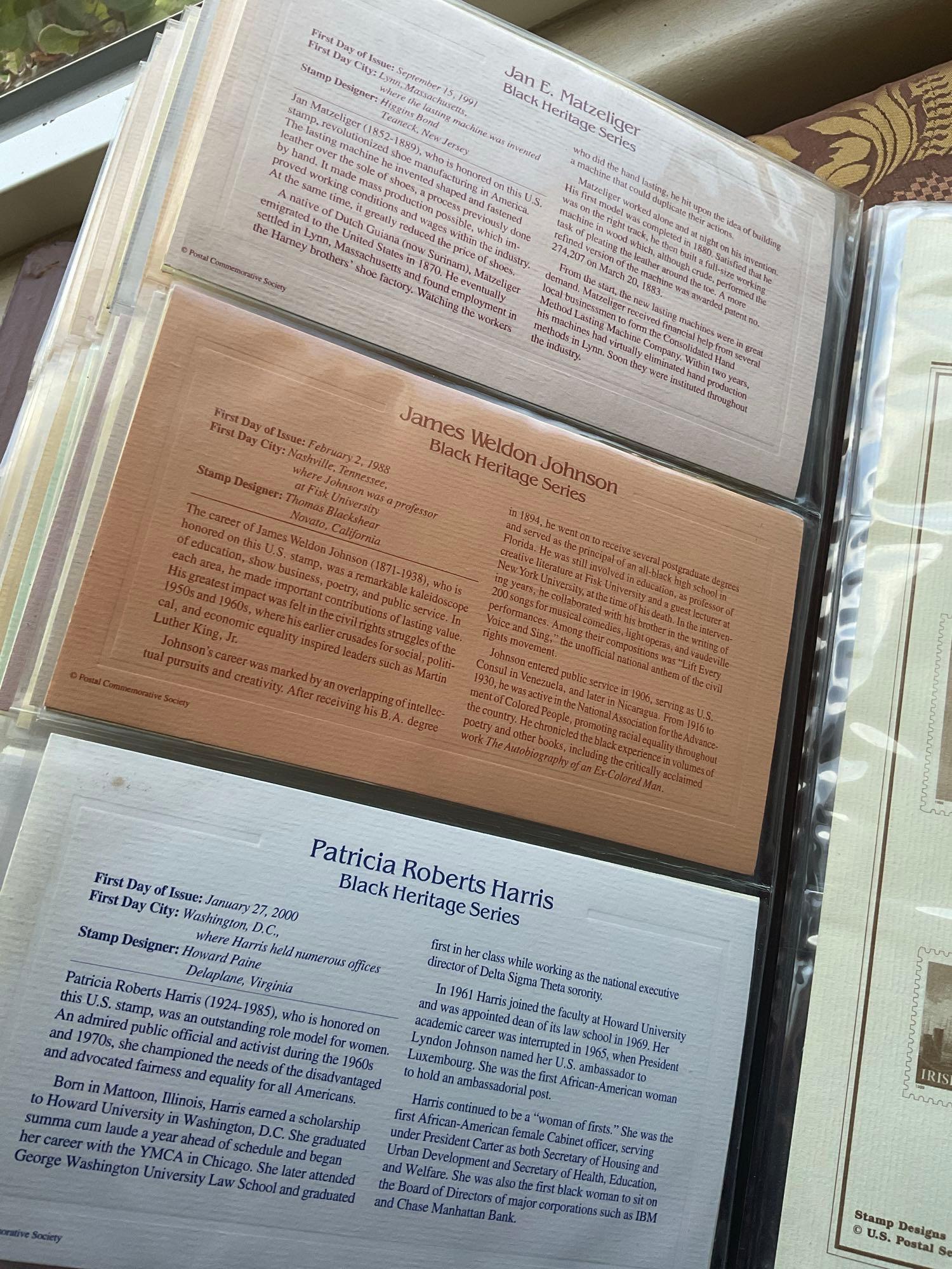 Golden Replica of Unites States stamps album with replicas on a gleaming surface 22kt gold & other