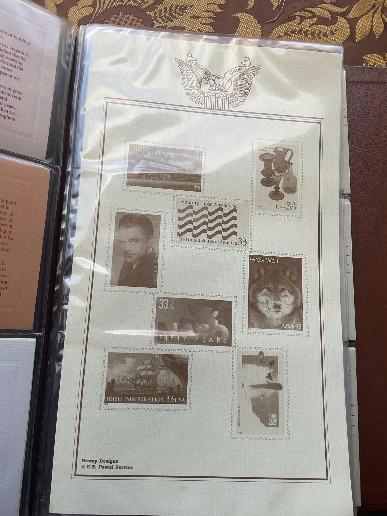 Golden Replica of Unites States stamps album with replicas on a gleaming surface 22kt gold & other