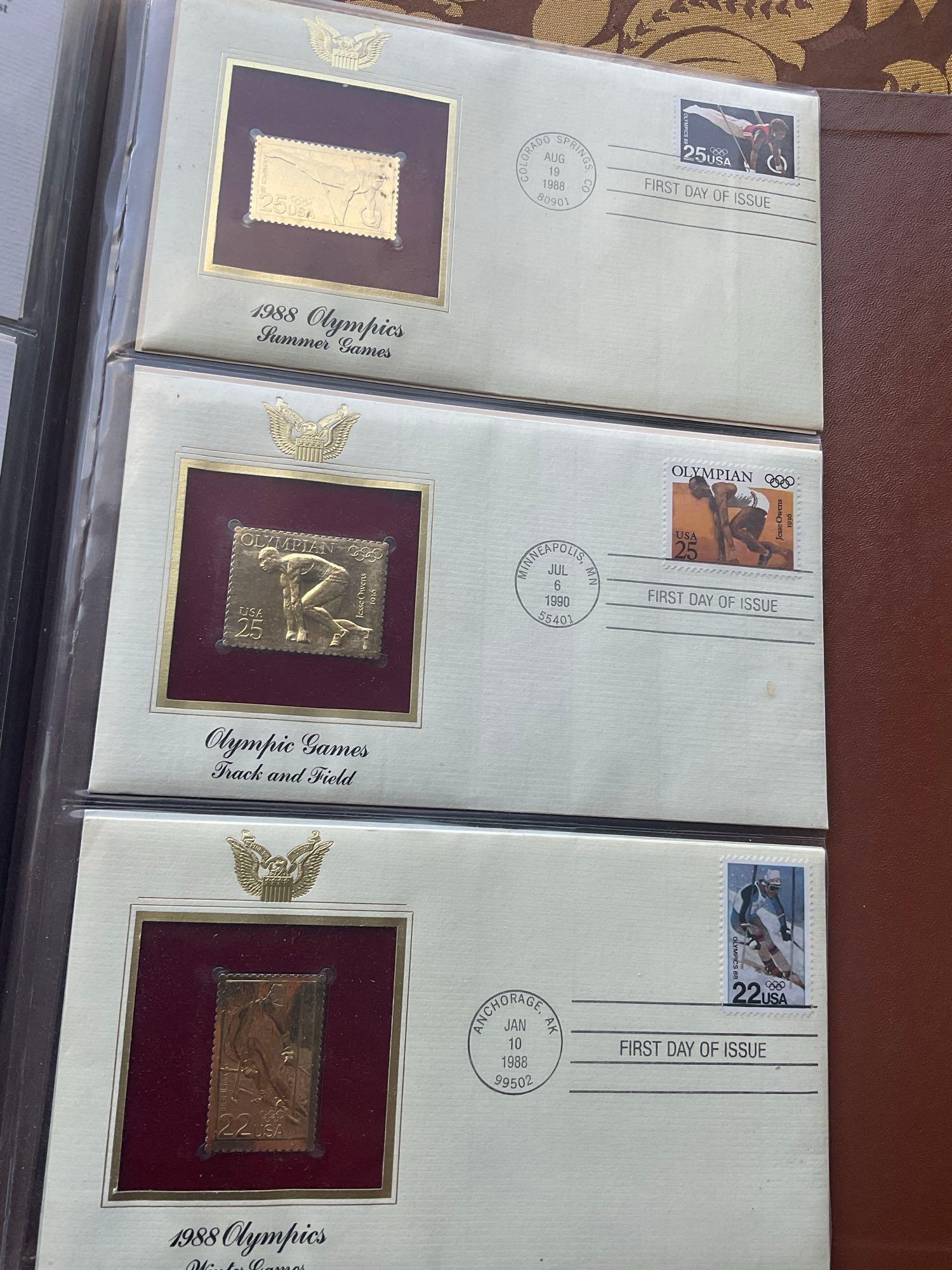 Golden Replica of Unites States stamps album with replicas on a gleaming surface 22kt gold & other
