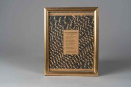 Framed copy of Dr. Seuss signed print.