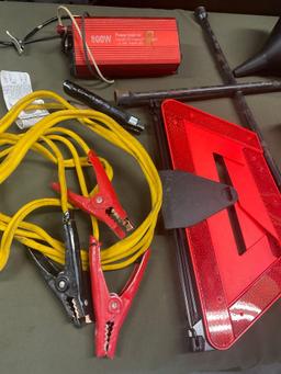 Power inverter, wrench, funnels, jumper cable, emergency triangle, sun shade. 7 pieces