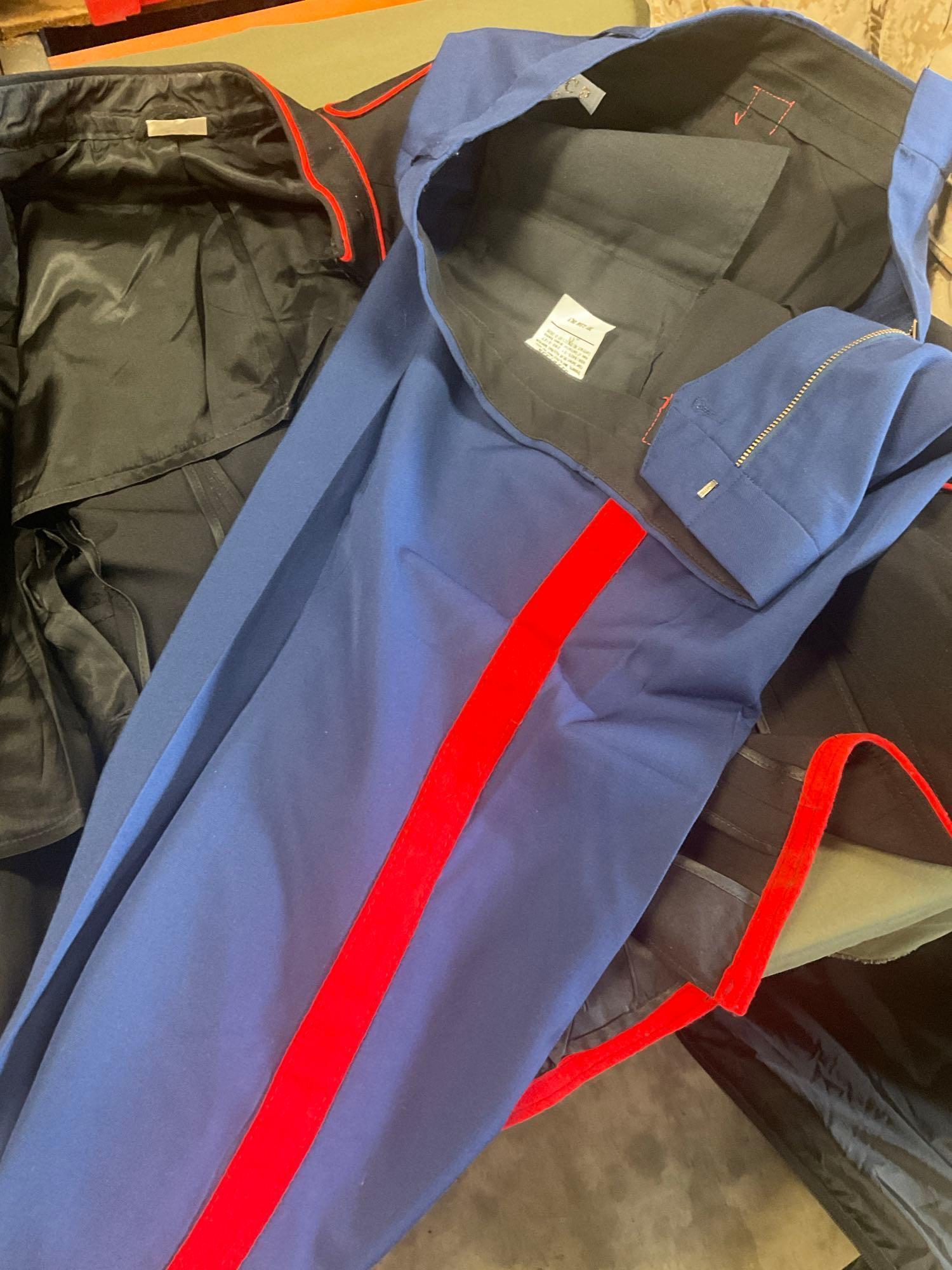 Large rolling bag, with tags all weather coat 42R, coat 44xs with pants 33s, with tags coat 40r, 42L