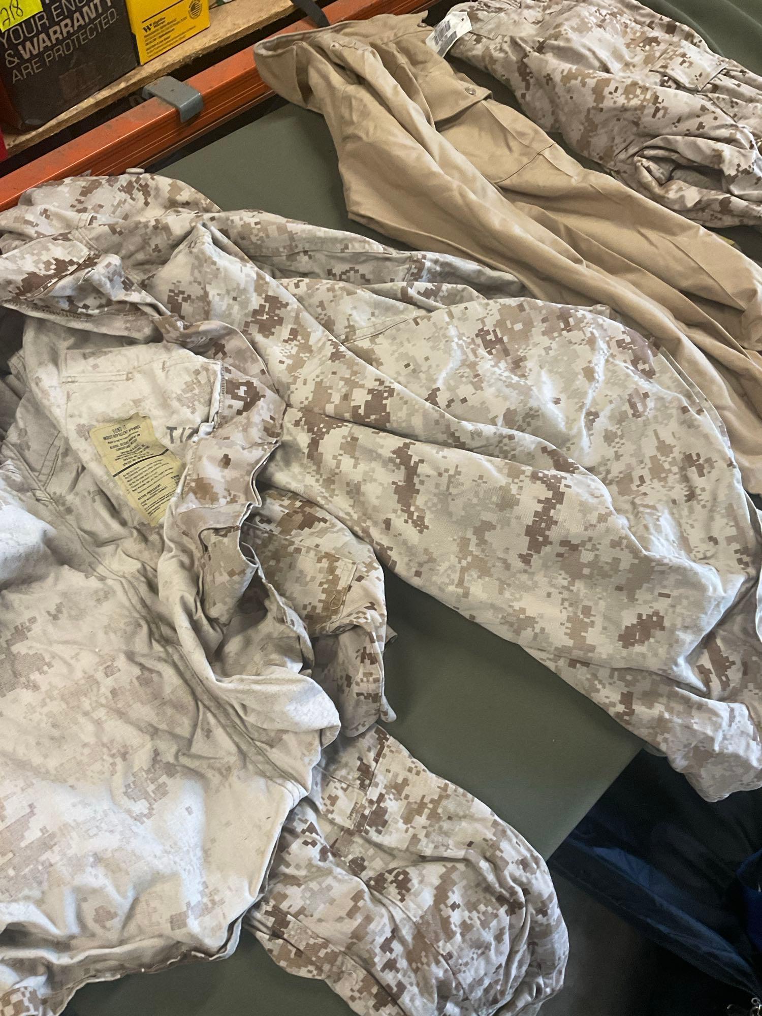 Large rolling bag, with tags all weather coat 42R, coat 44xs with pants 33s, with tags coat 40r, 42L